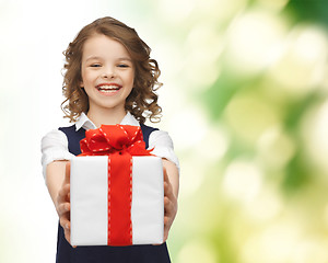 Image showing happy smiling girl with gift box