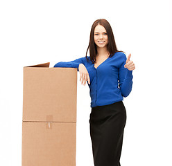 Image showing businesswoman with big boxes