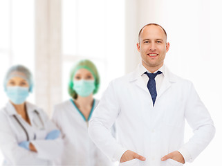 Image showing smiling male doctor in white coat