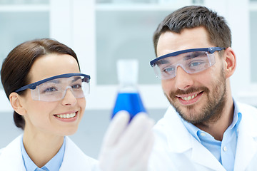 Image showing young scientists making test or research in lab