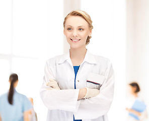 Image showing smiling young female doctor in hospital