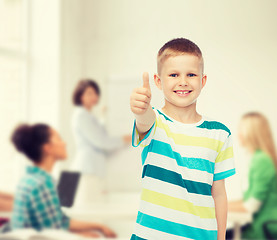 Image showing little boy in casual clothes with arms crossed