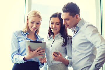 Image showing business team working with tablet pcs in office