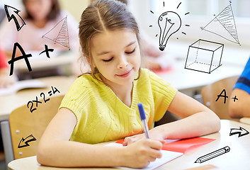 Image showing group of school kids writing test in classroom