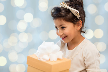 Image showing happy little girl with gift box
