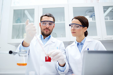 Image showing young scientists making test or research in lab