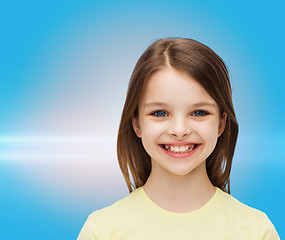 Image showing smiling little girl over white background