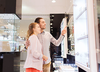 Image showing couple looking to shopping window at jewelry store