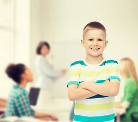 Image showing little boy in casual clothes with arms crossed