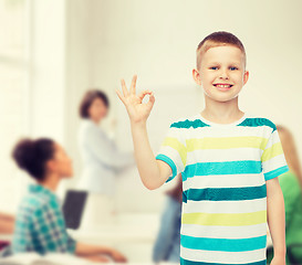 Image showing little boy in casual clothes making ok gesture