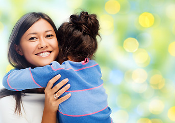 Image showing happy mother and daughter hugging