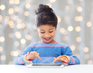 Image showing happy little girl with tablet pc computer