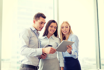 Image showing business team working with tablet pcs in office