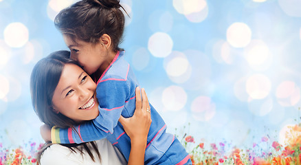 Image showing happy mother and daughter hugging