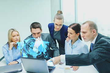 Image showing business team with laptop having discussion