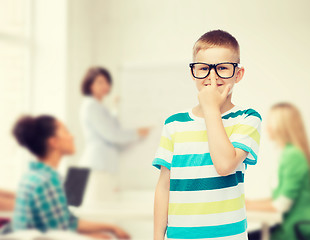 Image showing smiling little boy in eyeglasses