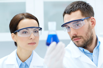 Image showing young scientists making test or research in lab