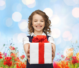 Image showing happy smiling girl with gift box