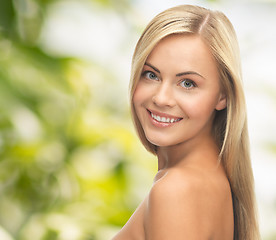 Image showing face of beautiful young happy woman with long hair