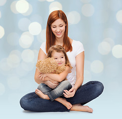 Image showing happy mother with adorable girl and teddy bear