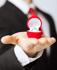 Image showing man with wedding ring and gift box