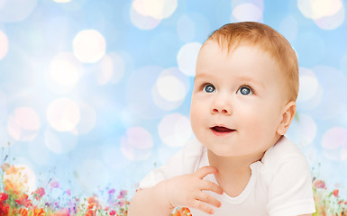 Image showing beautiful happy baby over poppy field background