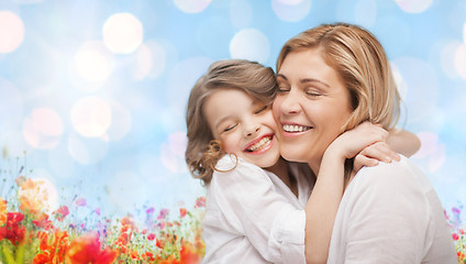 Image showing happy mother and daughter hugging