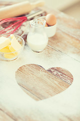 Image showing close up of heart of flour on wooden table at home