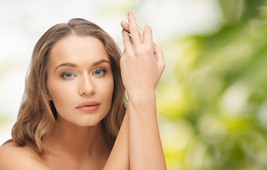 Image showing beautiful woman face and hands