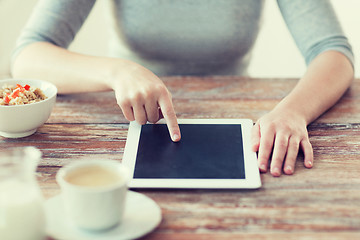 Image showing woman pointing finger to tablet pc computer