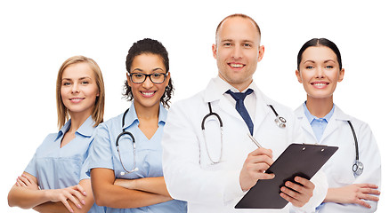 Image showing group of smiling doctors with clipboard