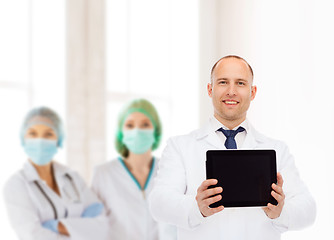 Image showing smiling male doctor with tablet pc