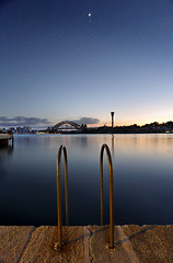 Image showing Mezzaluna over Sydney Harbour Bridge at twilight