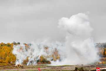 Image showing Russian tank T-90 hides in smoke screen from enemy