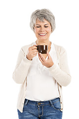 Image showing Elderly woman drinking coffee