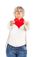 Image showing Holding a heart in her hands