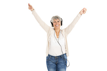 Image showing Elderly woman listen music