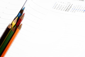 Image showing Color pencil and agenda