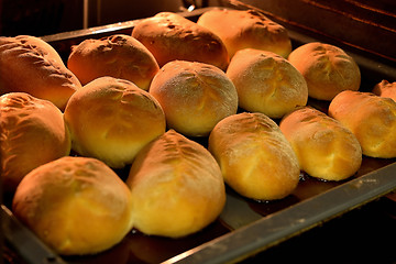 Image showing Baked cakes on a tray