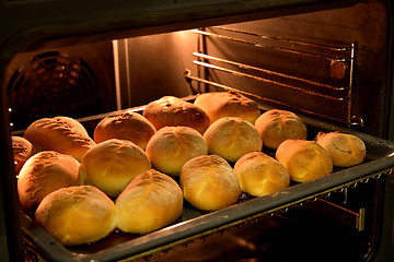 Image showing Baked cakes on a tray