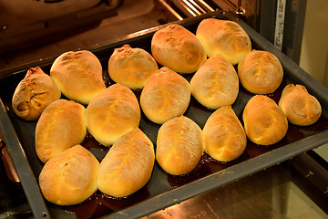 Image showing Baked cakes on a tray