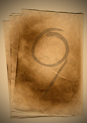 Image showing old paper sheet with the number nine