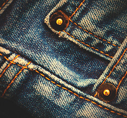 Image showing part of old blue jeans