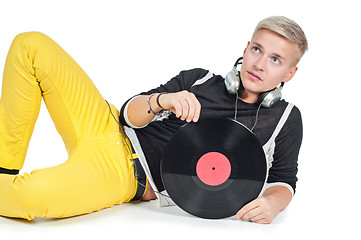 Image showing Male with headphones and vinyl