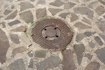 Image showing pipe on old town street