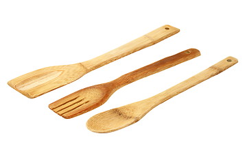 Image showing kitchen wooden utensils over white