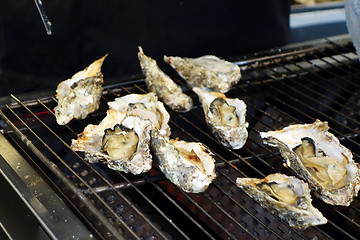 Image showing Grilled oysters at Miyajima island , Japan