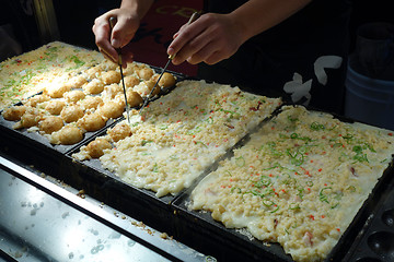 Image showing The making of Takoyaki in Osaka 