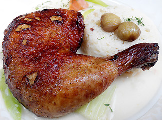 Image showing Baked chicken legs with rice and vegetables