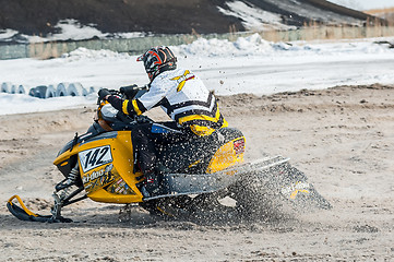 Image showing Snowmobile rider on sport track